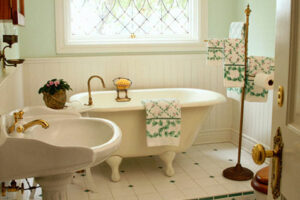 Bathroom with claw style tub and nice white tiles